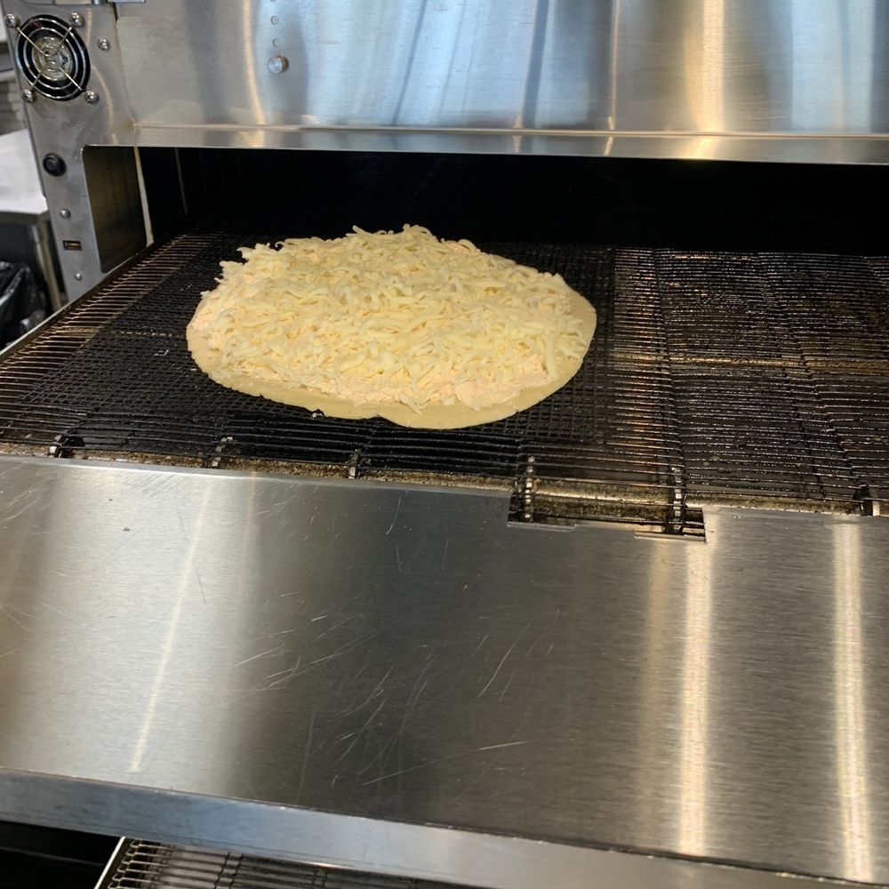 Azzip Pizza - In the oven - Pizza Near Me - Indianapolis, Indiana Azzip Pizza - In the oven - Pizza Near Me - Indianapolis, Indiana