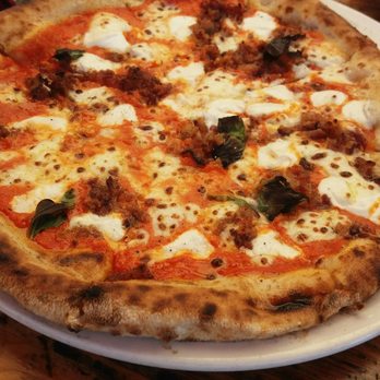 Forge Pizza - The options on the menu are excellent, but this beauty is the margherita pizza plus bacon, goat cheese, and calabrian peppers. Amazing! - Pizza Near Me - Oakland, California Forge Pizza - The options on the menu are excellent, but this beauty is the margherita pizza plus bacon, goat cheese, and calabrian peppers. Amazing! - Pizza Near Me - Oakland, California
