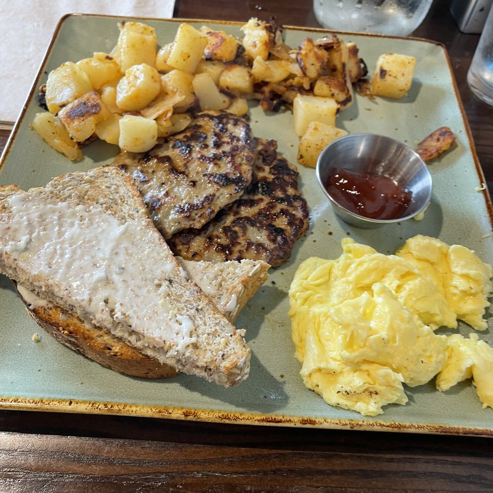 First Watch - Here is my meal - the Classic Breakfast meal - Scrabbled eggs, sausage patties, potatoes, and fresh grained toast! Taste DELICIOUS! - Breakfast & Brunch Near Me - Greenville, North Carolina First Watch - Here is my meal - the Classic Breakfast meal - Scrabbled eggs, sausage patties, potatoes, and fresh grained toast! Taste DELICIOUS! - Breakfast & Brunch Near Me - Greenville, North Carolina