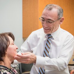 Simon Madorsky, MD - Dr. Madorsky examines a patient.