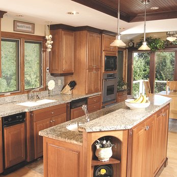 Oregon Deck & Remodeling - a kitchen with granite countertops - Decks & Railing Near Me - Sandy, Oregon