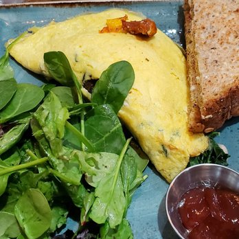 First Watch - Cold omelette with a haphazard side of spinach. Poor quality. - Breakfast & Brunch Near Me - Boca Raton, Florida
