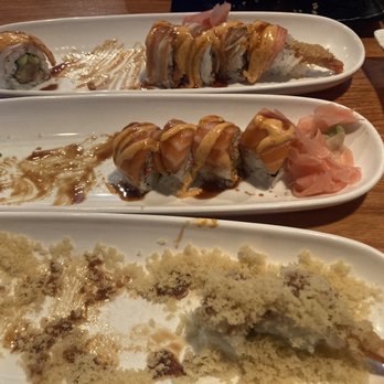 Kawa Sushi - Half eaten Shaggy Dog Roll, Alaska Roll, Crunchy Hand Roll. - Sushi Bars Near Me - Houston, Texas