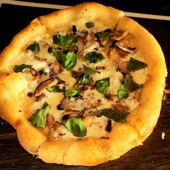 Plate - Mushroom pizza - Cocktail Bars Near Me - Kansas City, Missouri Plate - Mushroom pizza - Cocktail Bars Near Me - Kansas City, Missouri
