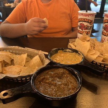 Torchy's Tacos - Chips, queso and salsa roja - Tacos Near Me - Baton Rouge, Louisiana Torchy's Tacos - Chips, queso and salsa roja - Tacos Near Me - Baton Rouge, Louisiana