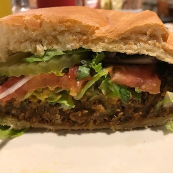 Mud Street Cafe - Veggie Burger - Has a combination of peanuts, cashews, lentils, soy vegetable protein, vegetables and spices with lettuce, tomato & onion - Cafes Near Me - Eureka Springs, Arkansas Mud Street Cafe - Veggie Burger - Has a combination of peanuts, cashews, lentils, soy vegetable protein, vegetables and spices with lettuce, tomato & onion - Cafes Near Me - Eureka Springs, Arkansas