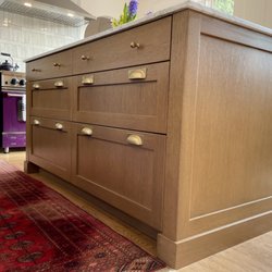 East Bay Cabinets - White Oak island, stained a bit darker than natural ~ Vinny gave me interior measurements of every drawer for perfect planning of storage.