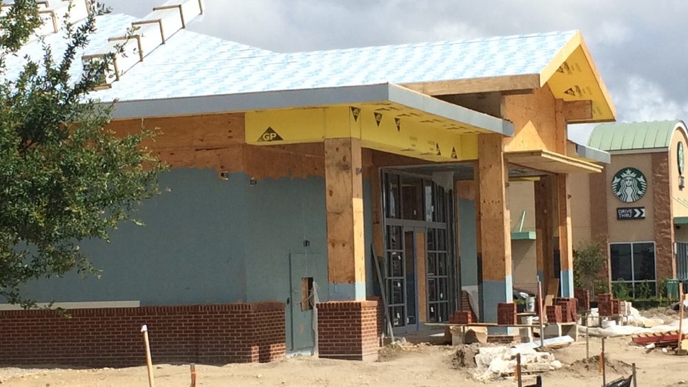 Slide of Tampa Roof Repair