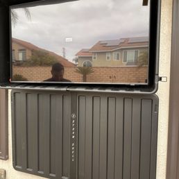 TV with protective cover in the "stow" position.