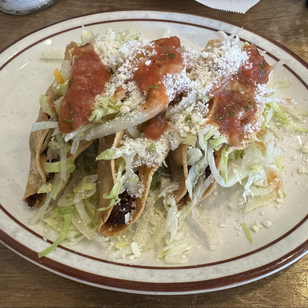 Casa Jimenez - Three shredded beef hard shell tacos with salsa. - Mexican Near Me - Ontario, California