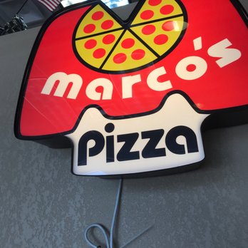 Marco's Pizza - a sign with a slice of pizza on it - Pizza Near Me - Albany, Georgia