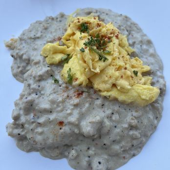 Crosby’s - Biscuits and gravy. Biscuits were herb and cheddar. Sausage gravy. Very good. - New American Near Me - Cedar Rapids, Iowa