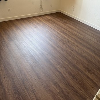 Castaneda Floor - Had damaged carpet removed and hardwood vinyl flooring installed in my bedroom - Flooring Near Me Castaneda Floor - Had damaged carpet removed and hardwood vinyl flooring installed in my bedroom - Flooring Near Me
