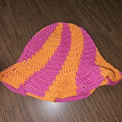 Michaels - Pink and orange crocheted sun hat.