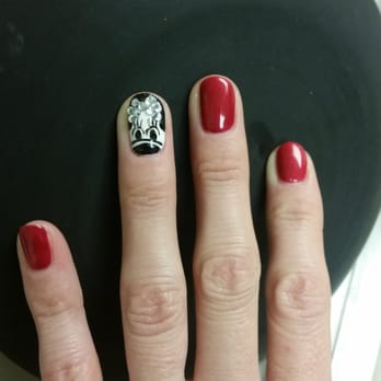 Bella Nails & Spa - Does not look like Minnie Mouse, paint is already chipping off, hair is stuck in the rhinestones with visible glue. NOT HAPPY. - Nail Salons Near Me - Oxnard, California