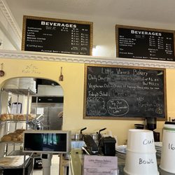 Little Vienna Bakery - Fresh bread on the racks and menus.