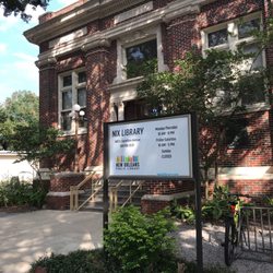 New Orleans Public Library - Nix Library with posted hours 8/25/18