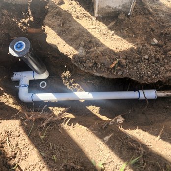 Yard Work - a pipe and a hose in the ground - Lawn Services Near Me Yard Work - a pipe and a hose in the ground - Lawn Services Near Me