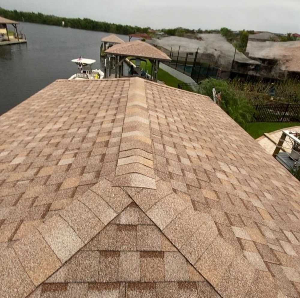 Slide of JCOF Roofing