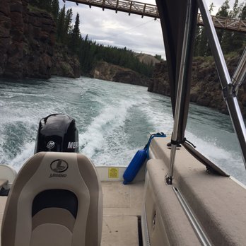 Captain Ken's Adventures - Zipping through the bridge at Miles Canyon - Boat Tours Near Me - Whitehorse, Yukon Captain Ken's Adventures - Zipping through the bridge at Miles Canyon - Boat Tours Near Me - Whitehorse, Yukon