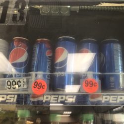 LA Fuel - Cashier would not honor 99 cent sale price but charged extra for beverages!