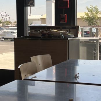 Chipotle Mexican Grill - a table and chairs - Fast Food Near Me - Los Banos, California