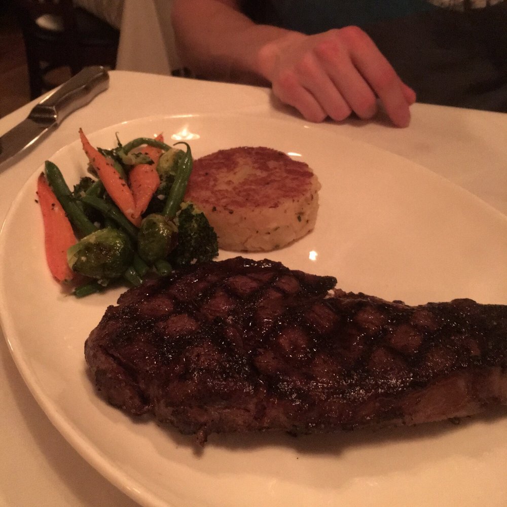 Buckhead's - Ribeye with potato pancake and veggies - Steakhouses Near Me - Richmond, Virginia Buckhead's - Ribeye with potato pancake and veggies - Steakhouses Near Me - Richmond, Virginia