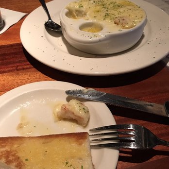Charleston's - Shrimp Cargot with buttery toast wedges for dipping in garlic butter. - American Near Me - Mesa, Arizona