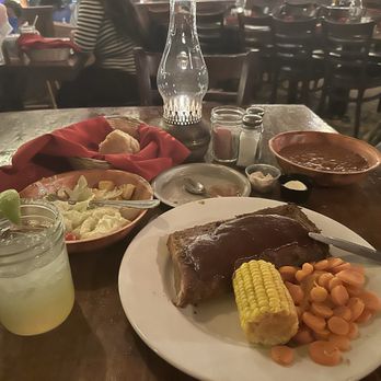 Rustler's Rooste - Salad, bread bowl, side beans, ribs, corn, carrots, butter - the meat was good. Salad good. Veggies gross. - Steakhouses Near Me - Phoenix, Arizona
