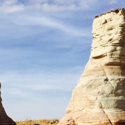 Navajo Nation - Two upright rock formations along side of the road.