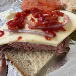Dave's Deli & Gelato - Chopped roasted pepper, 2 onion shreds. Stale rye. Fake mayo.