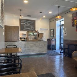 The Mug - Order counter, three tables and back door