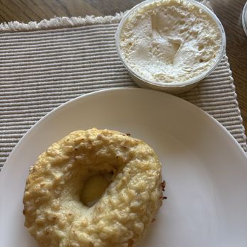 Big Apple Bagels - French onion bagel and plain cream cheese - Breakfast & Brunch Near Me - Fenton, Michigan Big Apple Bagels - French onion bagel and plain cream cheese - Breakfast & Brunch Near Me - Fenton, Michigan