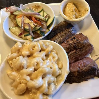 Neat & Noble - 6 oz bourbon butter steak, Mac & cheese, and Vegetable of the Day - Bars Near Me - Summerville, South Carolina