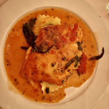 Lola's Bistro - Seared halibut over mushroom ravioli. Absolutely delicious - Italian Near Me - Key West, Florida