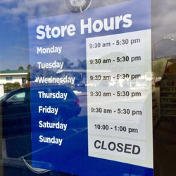 The Medicine Shoppe - Store Hours on the front window