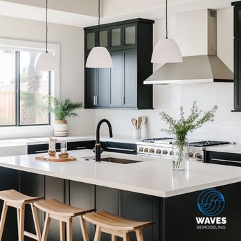 Waves Remodeling - This stunning kitchen combines black cabinetry with natural wood accents and crisp white countertops, creating a welcoming and chic space. - General Contractors Near Me - Sunnyvale, California Waves Remodeling - This stunning kitchen combines black cabinetry with natural wood accents and crisp white countertops, creating a welcoming and chic space. - General Contractors Near Me - Sunnyvale, California