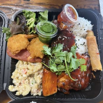 Makai Island - 808 super plate (fried shrimp, BBQ chicken, BBQ ribs, lumpia, spam, rice, Mac salad, house salad, sauces) - Barbeque Near Me - Renton, Washington
