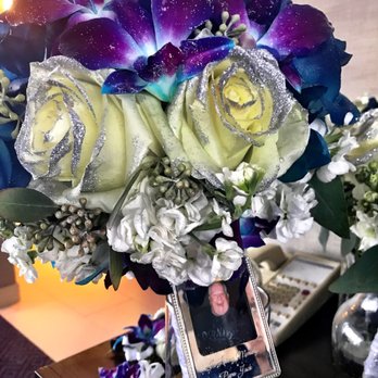 Lucy's Flowers and Gifts - bridal bouquet with photo of grandfather - Florists Near Me - Burbank, Illinois Lucy's Flowers and Gifts - bridal bouquet with photo of grandfather - Florists Near Me - Burbank, Illinois