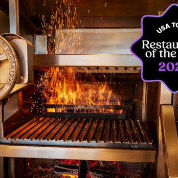 FYR Short North - a grill with flames in the background - Steakhouses Near Me - Columbus, Ohio