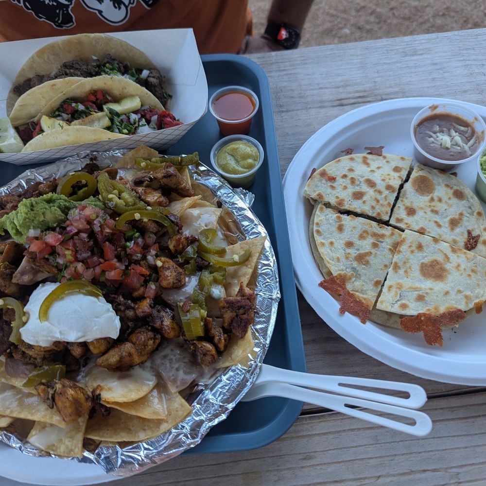Mission X Tacos - Borracho nachos, quesadilla (w/beans, avocado, sour cream, chipotle crema), bistec taco/flour, pastor taco/corn, red and green salsas. - Tacos Near Me - Austin, Texas Mission X Tacos - Borracho nachos, quesadilla (w/beans, avocado, sour cream, chipotle crema), bistec taco/flour, pastor taco/corn, red and green salsas. - Tacos Near Me - Austin, Texas