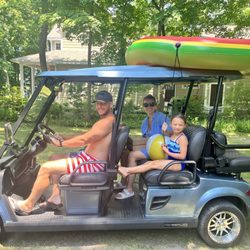 Red Arrow Ride - We love the golf carts and water floats!
