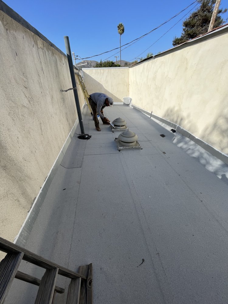 Slide of El Puma Roofing