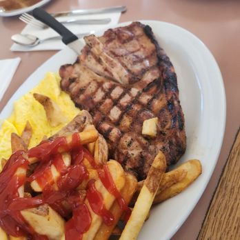 Wren's Cafe - Pork steak with steak fries eggs and white toast i never get anything else - Breakfast & Brunch Near Me - Vacaville, California Wren's Cafe - Pork steak with steak fries eggs and white toast i never get anything else - Breakfast & Brunch Near Me - Vacaville, California