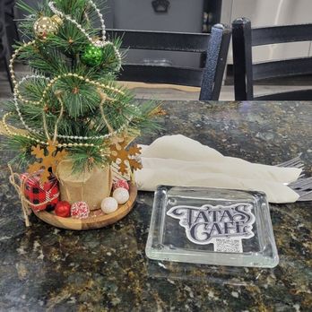 Tata's Cafe - Cute table decor and complimentary snacks for the doggies in the background - Breakfast & Brunch Near Me - Hawthorne, California Tata's Cafe - Cute table decor and complimentary snacks for the doggies in the background - Breakfast & Brunch Near Me - Hawthorne, California