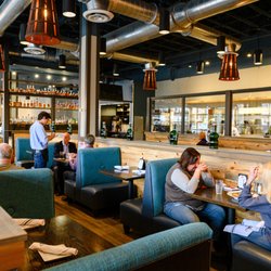 Oh George! Tables & Taphouse - 24 craft brews on draft, fire roasted pizza, salads & more. Located in University Mall, Fairfax, VA.