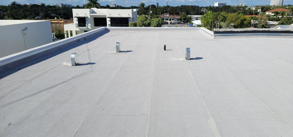 Slide of Miami Roofing Solutions