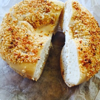 Brooklyn Bagel Bakery - Onion bagel with light cream cheese - Bagels Near Me - Arlington, Virginia Brooklyn Bagel Bakery - Onion bagel with light cream cheese - Bagels Near Me - Arlington, Virginia