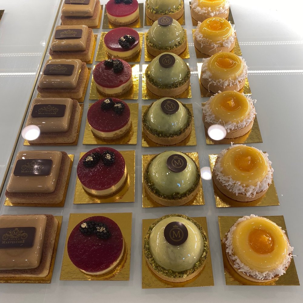 Marvel Cake - The pistachio tart (second from the right) was close to $10 but worth it. Better than the spiral croissant! - Bakeries Near Me - Campbell, California