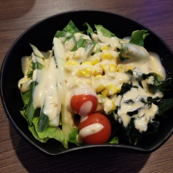Hana Ichimonme - A good quality complimentary salad with a decent amount of tasty dressing. - Ramen Near Me - Los Angeles, California